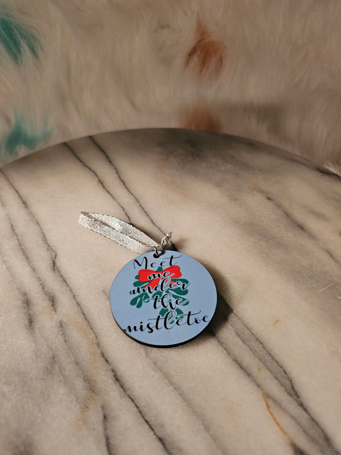 2 inch sublimation Meet me under the mistletoe Christmas oranment.